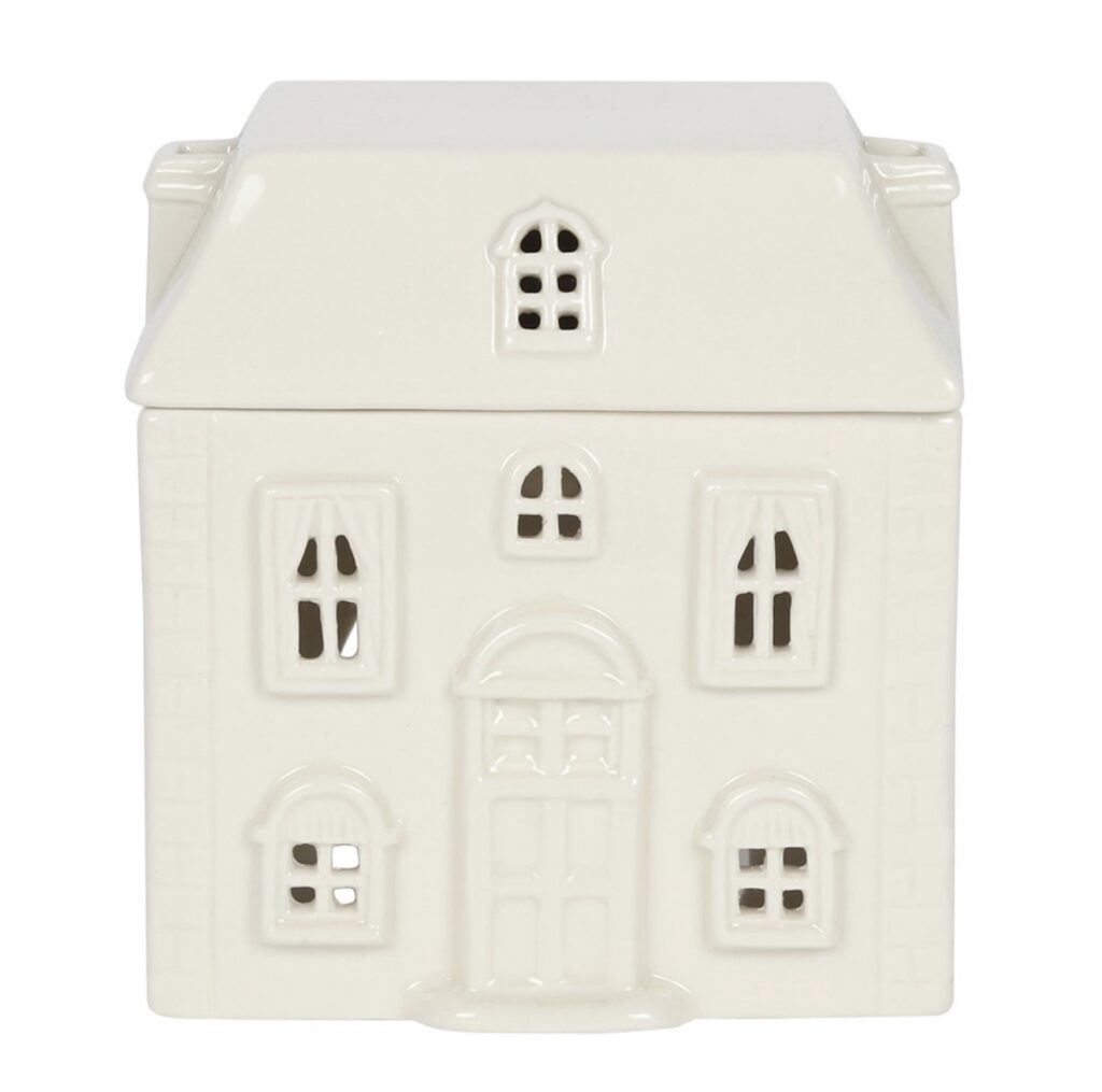 white ceramic house wax burner